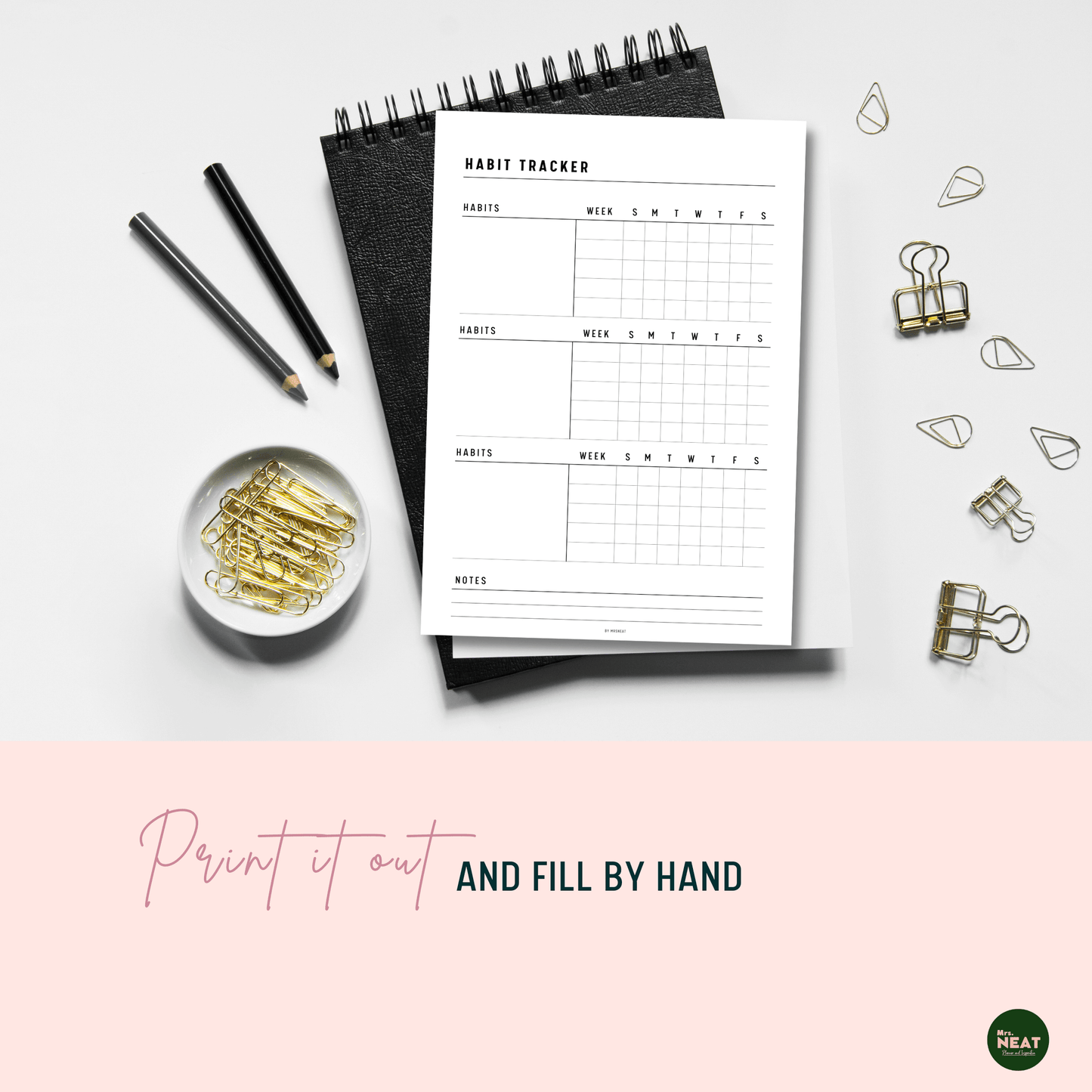 Printed Out Daily Habit Tracker Planner and put on the black book with aesthetic stationaries