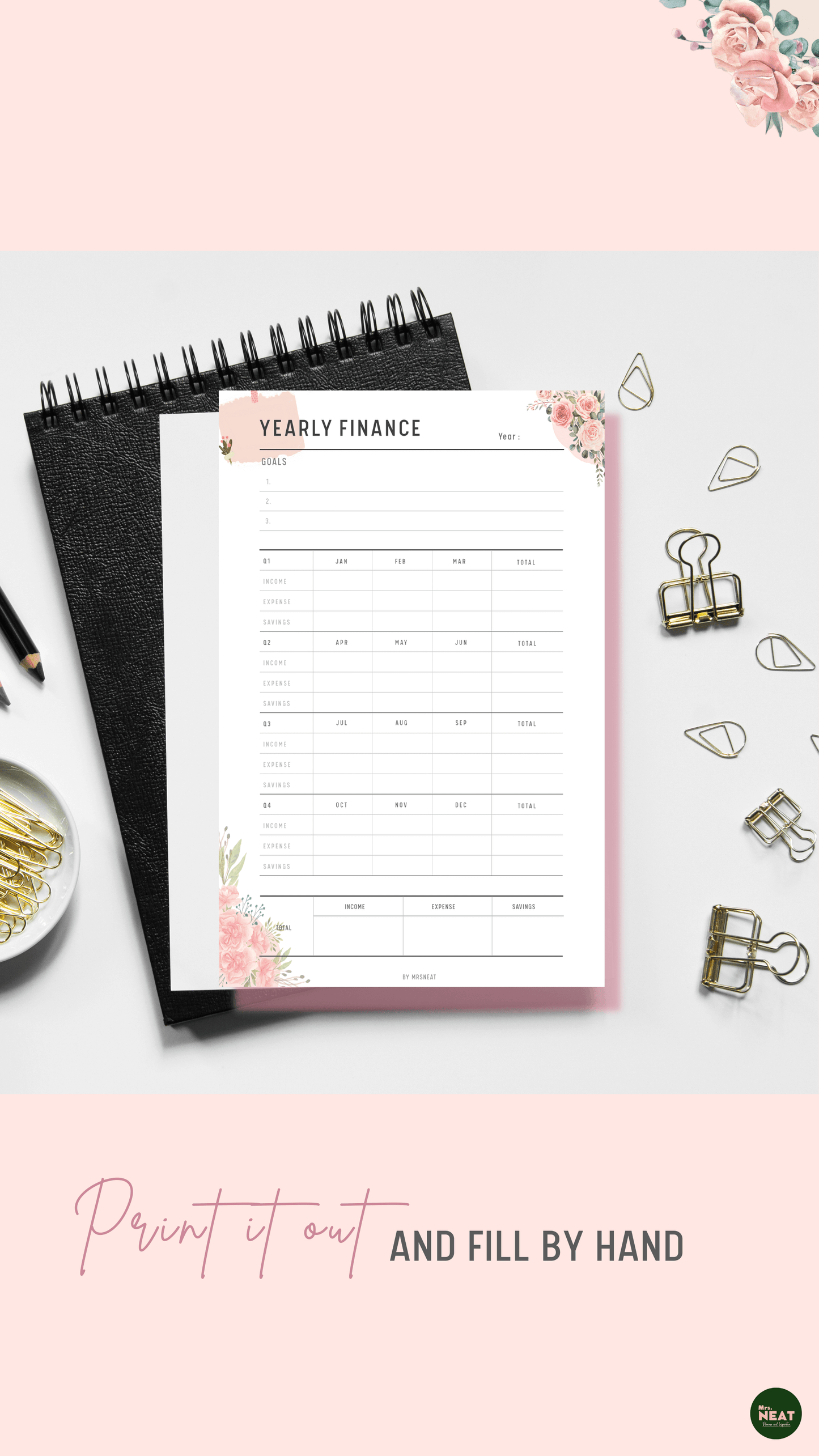 Floral Yearly Financial Planner printed out and put on the black book with stationery surround