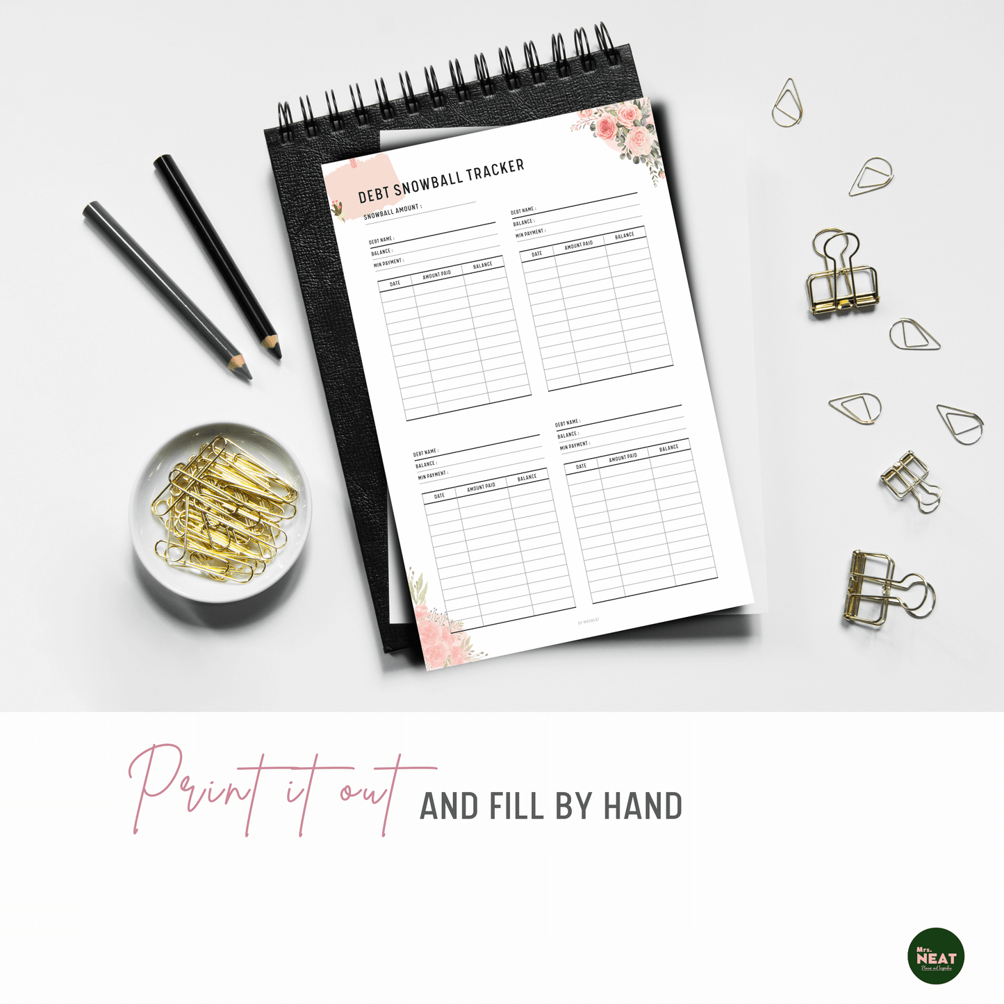 Cute Floral Pink Debt Snowball Tracker printed out and put on the black book with aesthetic stationery surround