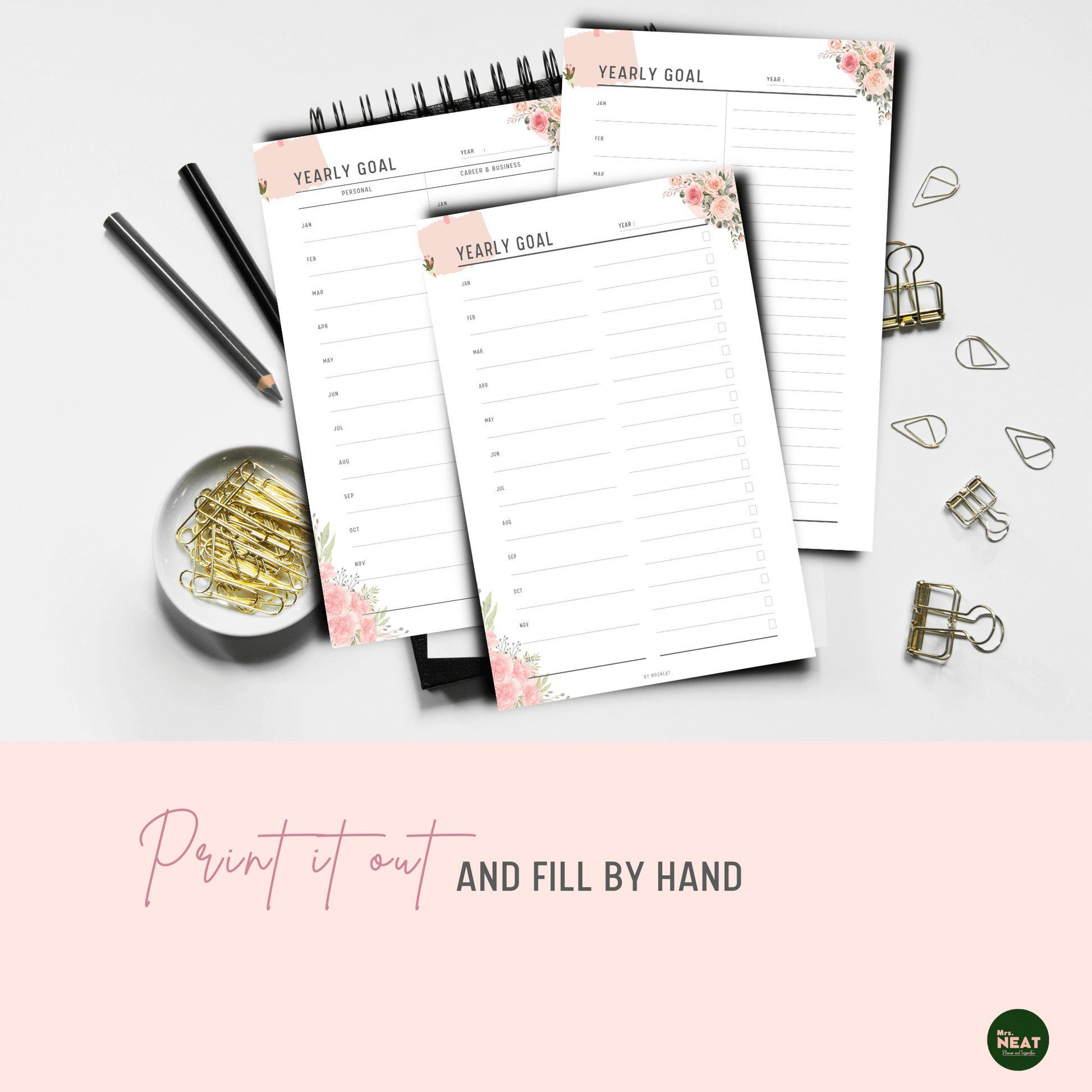 3 pages Floral Yearly Goal Planner printed out and put on the black books with stationery surround