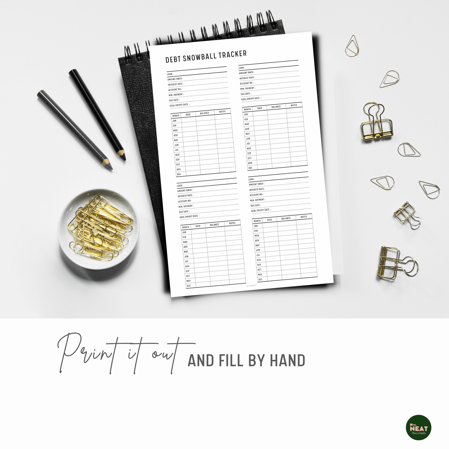 Debt Snowball Tracker Detailed printed out and put on the black book with aesthetic stationery surround
