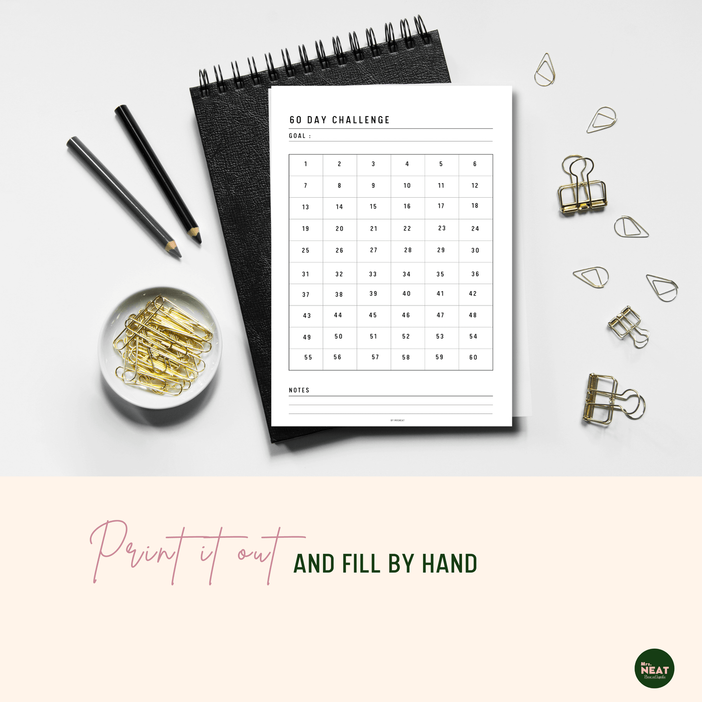 60 Day Challenge Planner printed out and put on the black book with aesthetic stationery surround