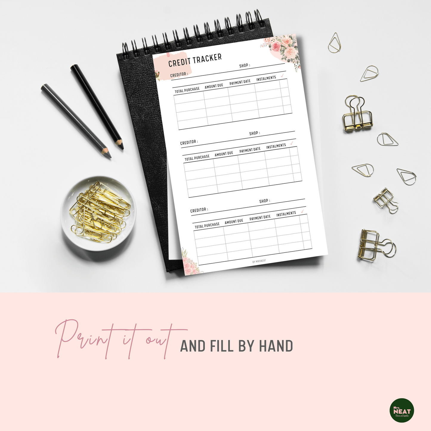 Beautiful and cute floral credit tracker planner printed out and put on the black book with aesthetic stationary