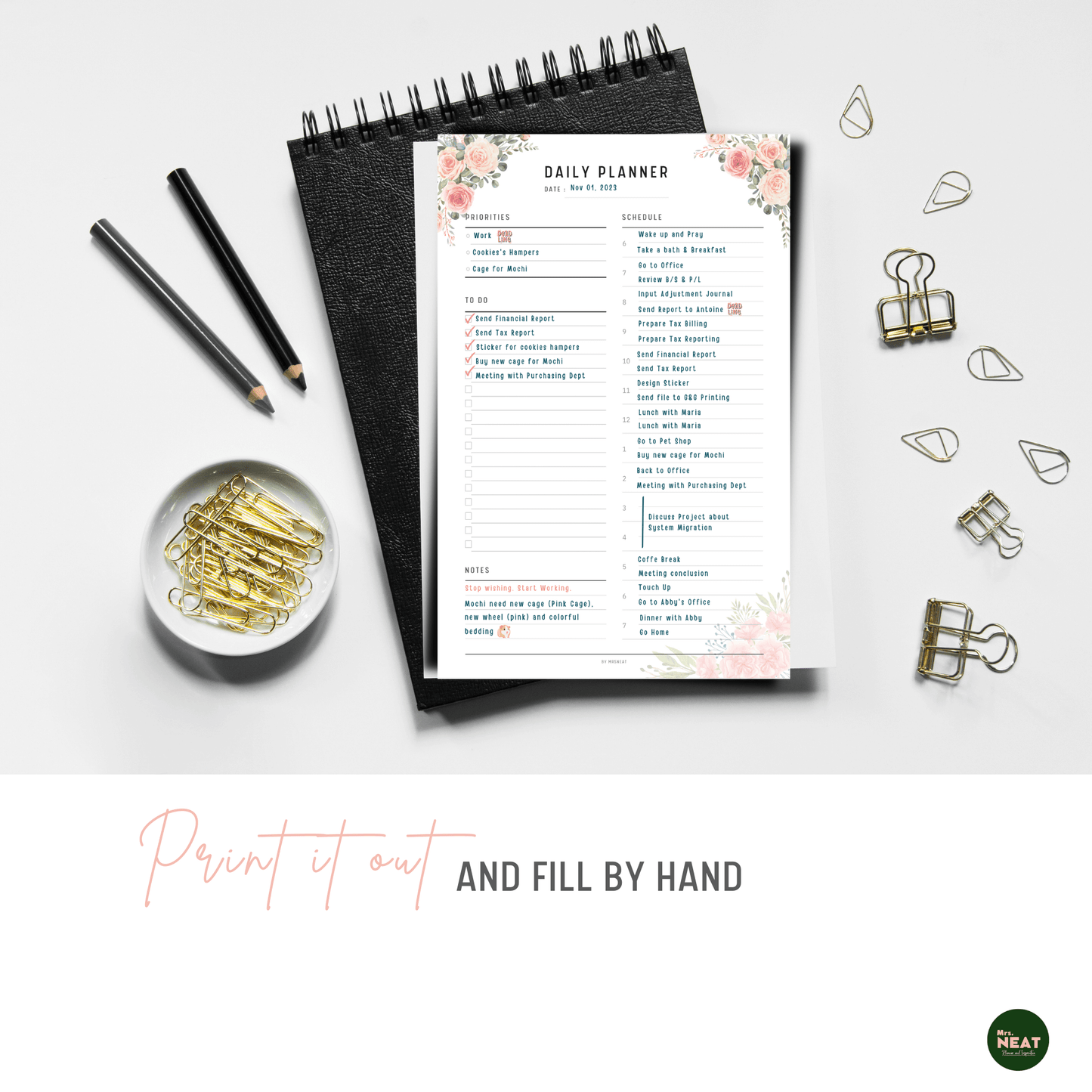 Floral Daily Planner Printable printed out on the paper with stationery surround