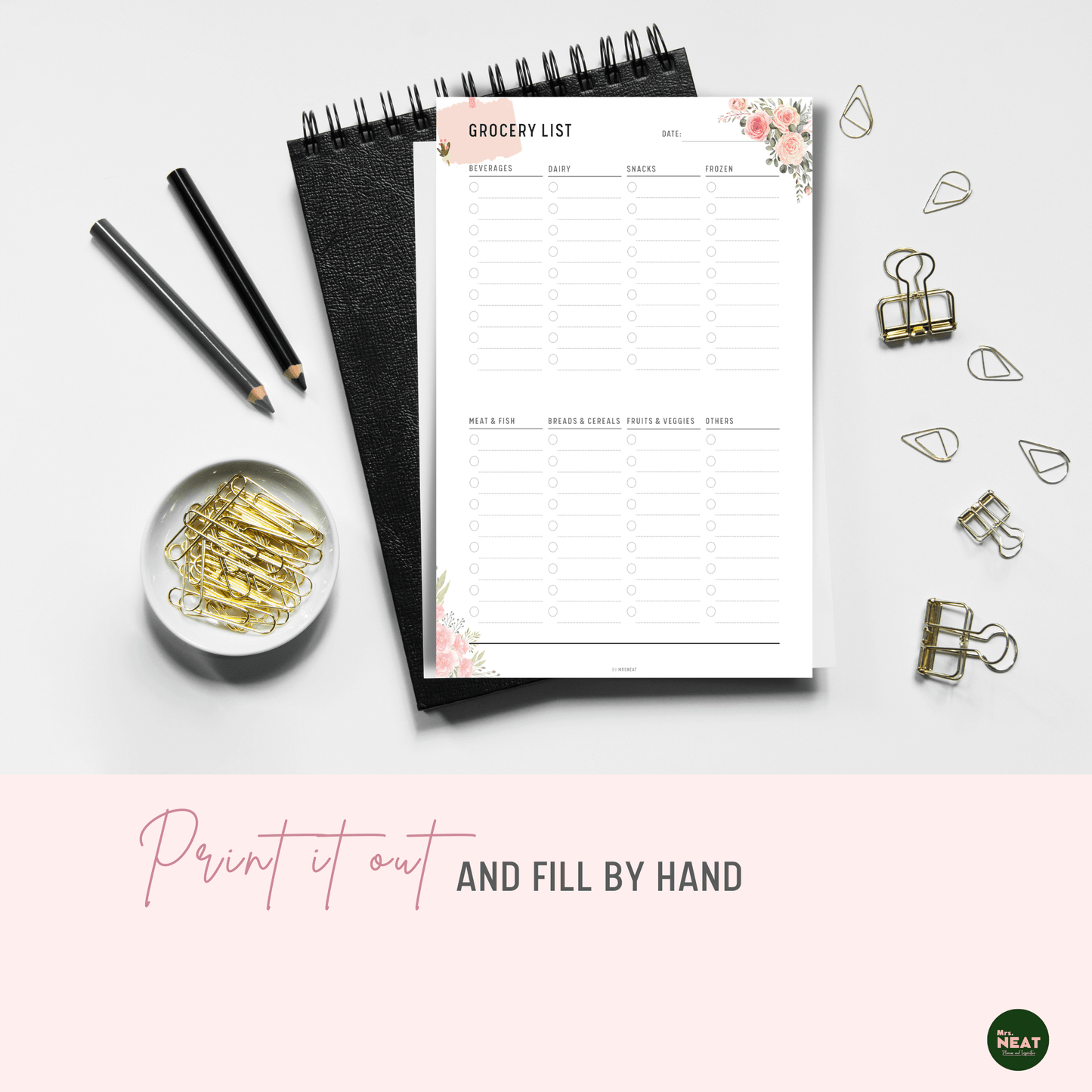 Floral Grocery List Printable Planner printed out on paper and put on the black book with stationery surround