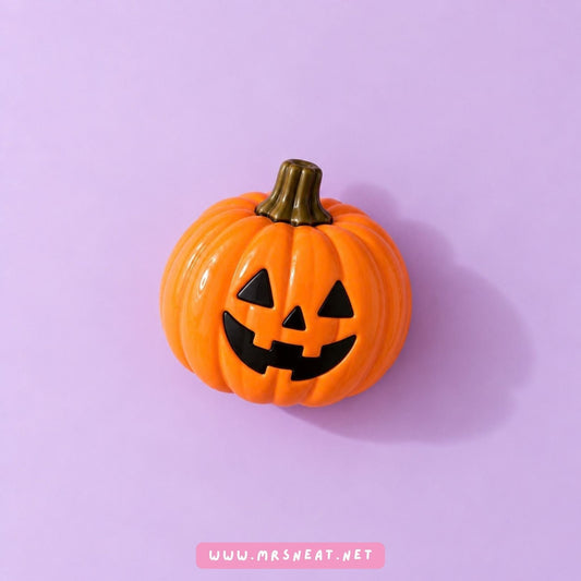 Halloween pumpkin decoration on a soft purple background