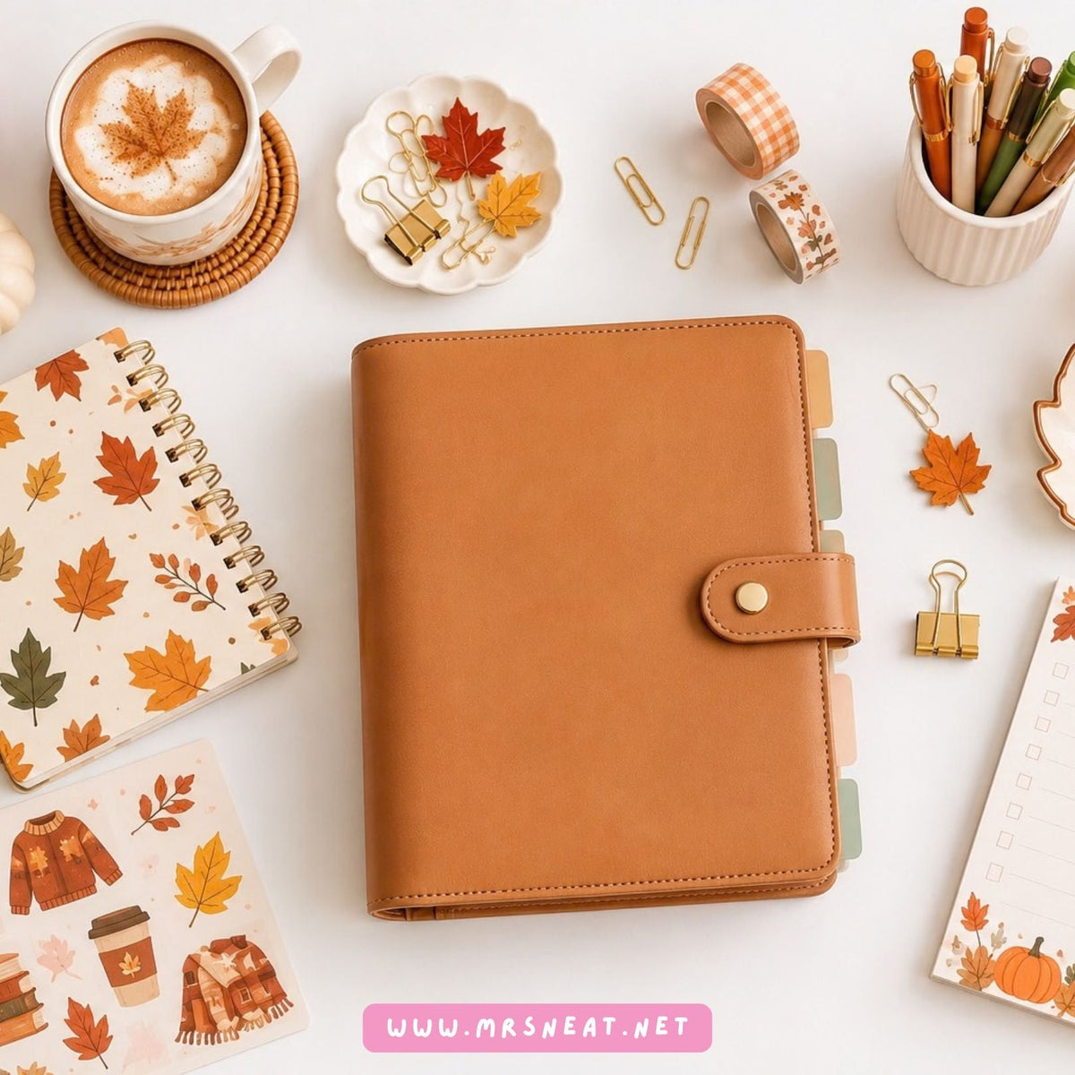Fall planner collection cover featuring a warm brown planner surrounded by autumn leaves, fall stationery, coffee, and cozy seasonal accessories