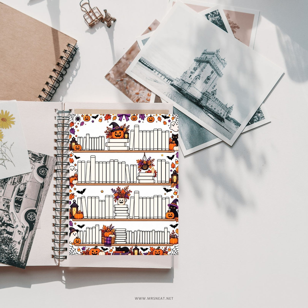 Halloween reading challenge printable with 100 book spaces for recording finished books and reaching yearly reading goals
