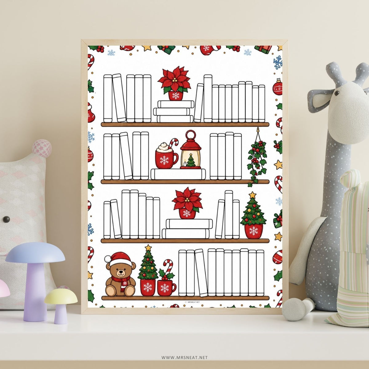 A framed Christmas-themed bookshelf art print displayed on a shelf, surrounded by plush toys and small decorative items. The print features illustrated bookshelves with books, poinsettias, candy canes, a teddy bear, and small holiday decorations.