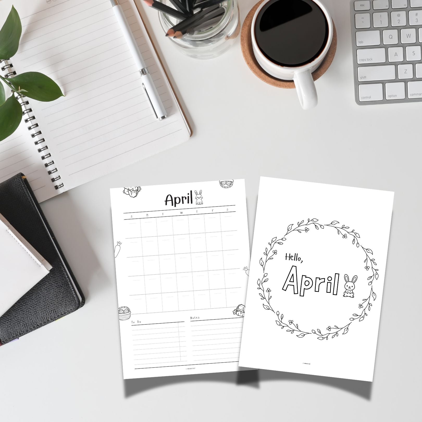 Two April-themed pages on a desk with stationery items.
