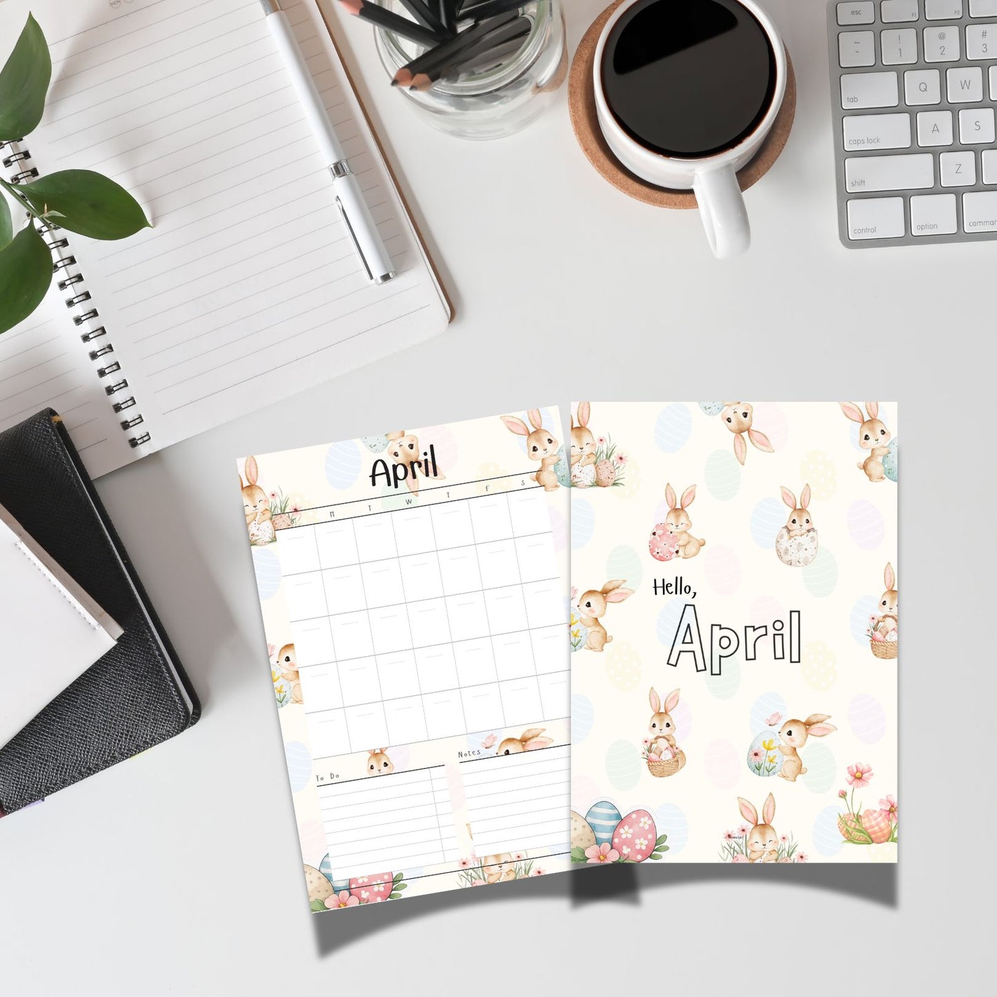April planner with bunny design on a desk with office supplies