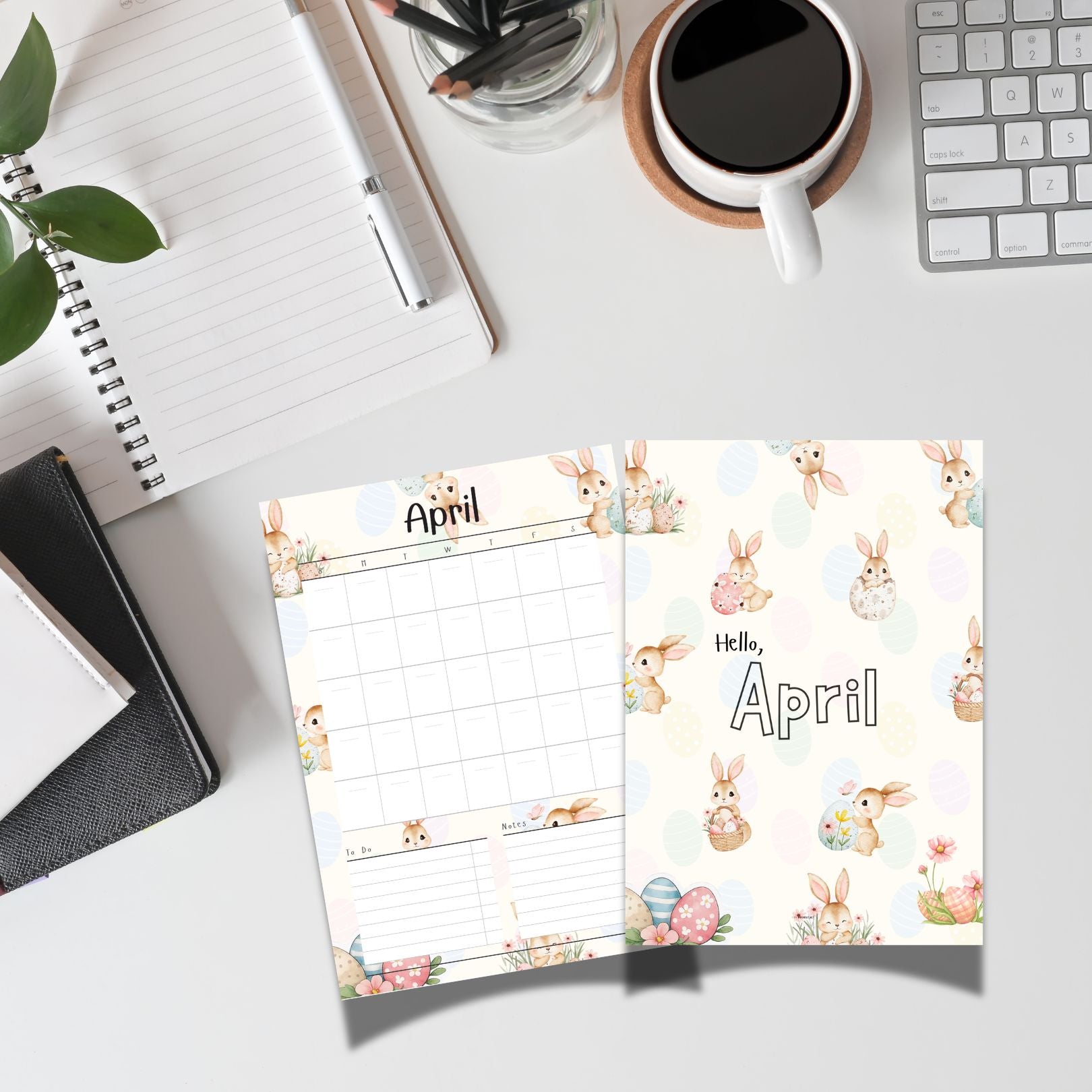April planner with bunny design on a desk with office supplies