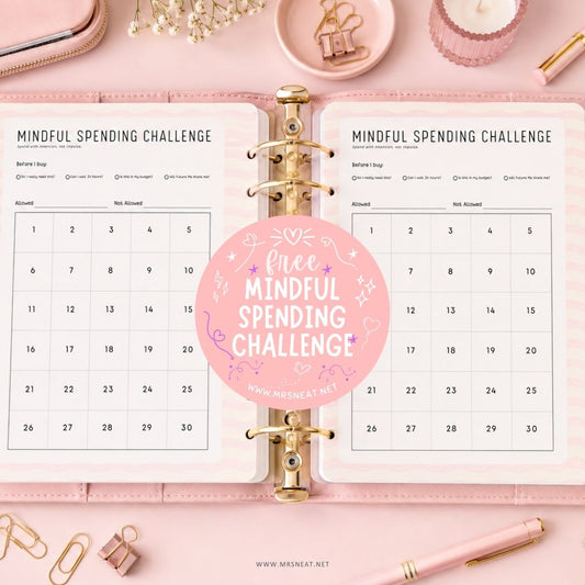 Free Mindful Spending Challenge printable displayed in a budget binder