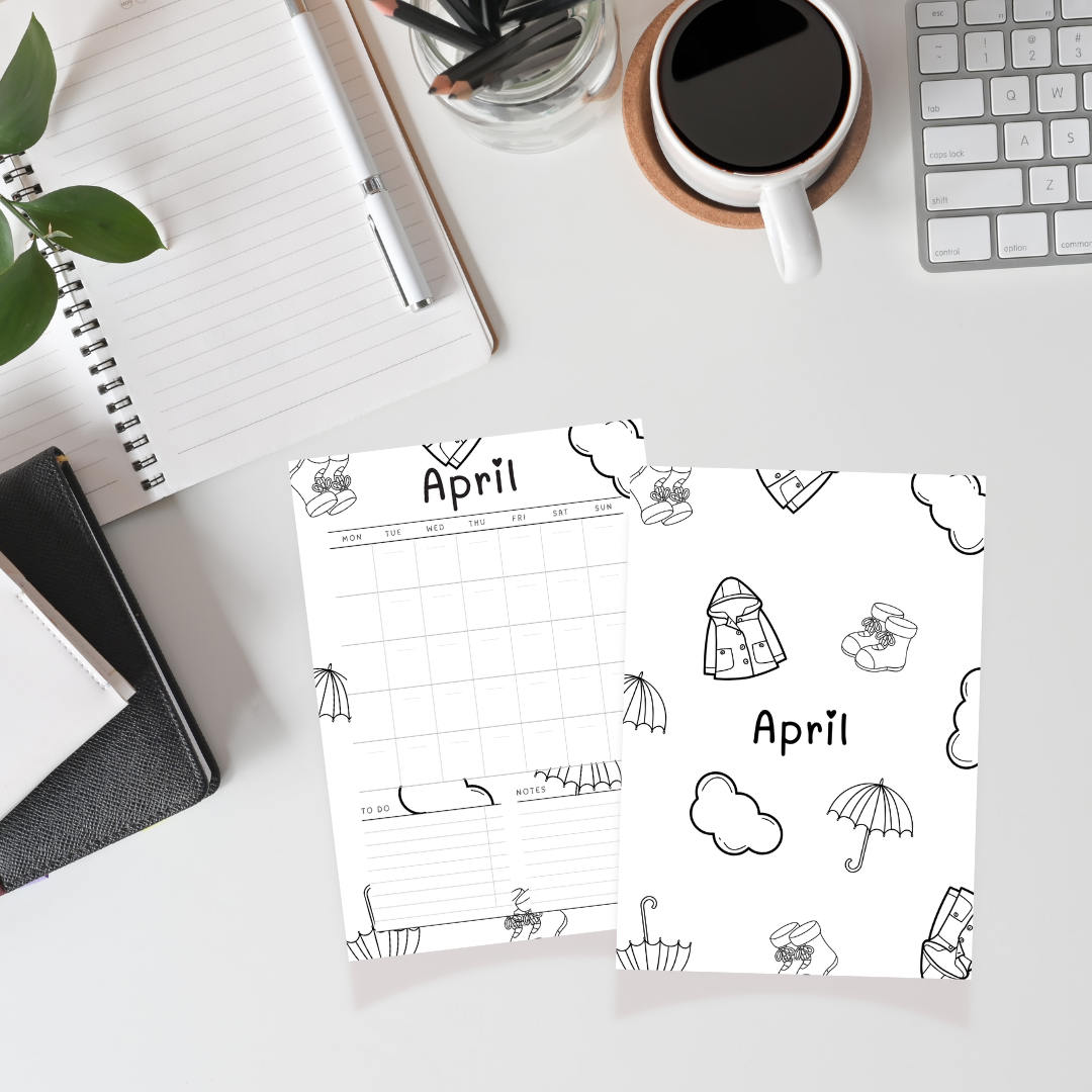 April calendar page with weather-themed illustrations on a desk with office supplies.
