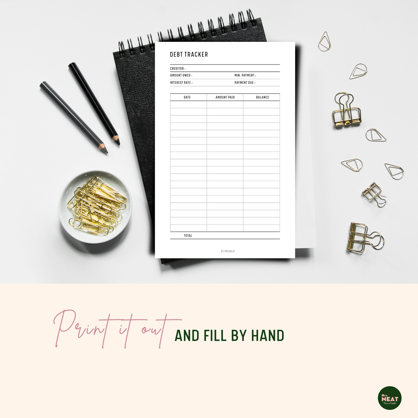 Minimalist Debt Payment Tracker Planner Printable printed out and put on the black book