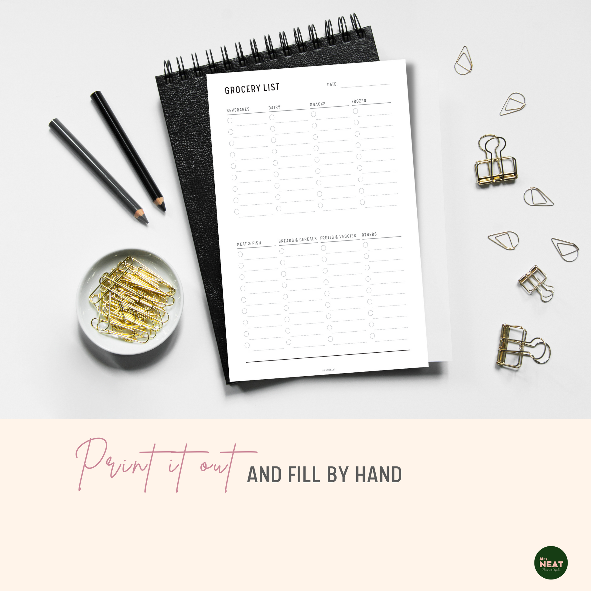 Minimalist Grocery List Planner Printable printed out on paper and put on the black book