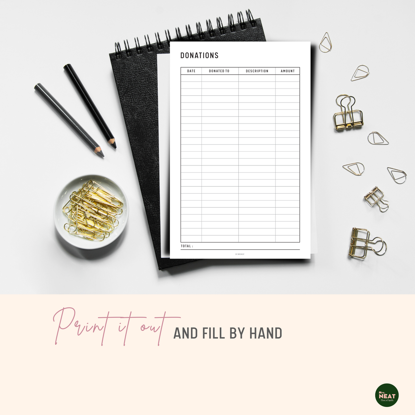 Donation Tracker Planner Printable printed out on paper and put on the black book