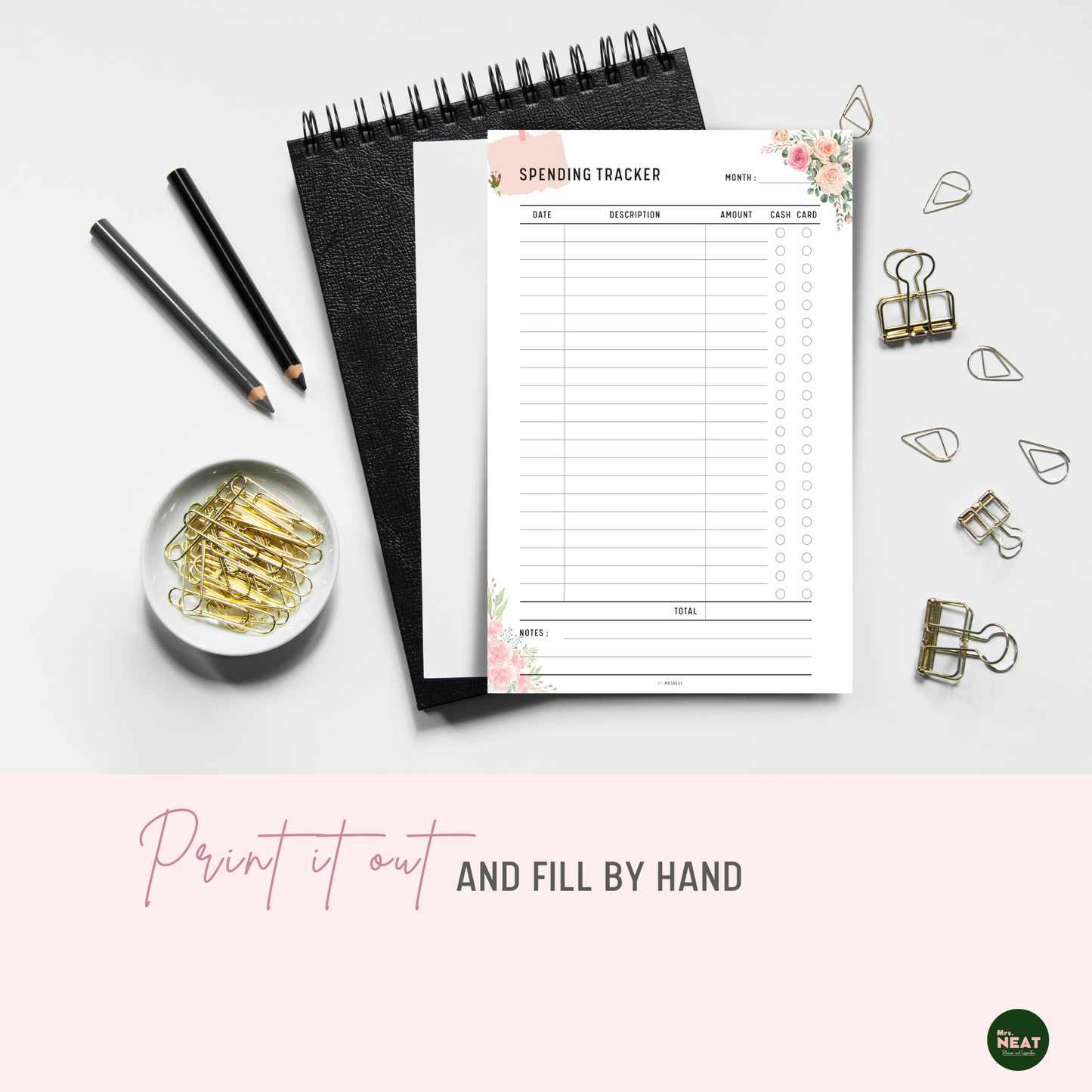 Floral Spending Tracker Printable Planner printed out on paper and put on the black book