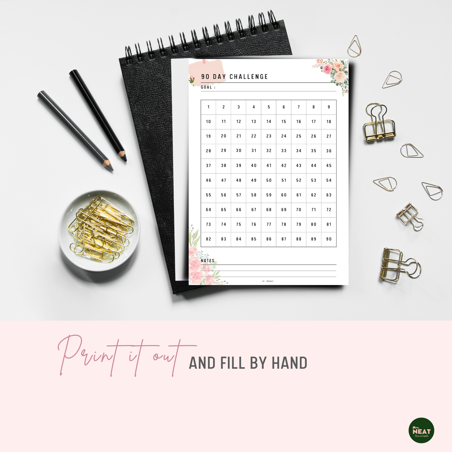 Floral 90 Day Challenge Habit Tracker Printable Planner printed out on paper
