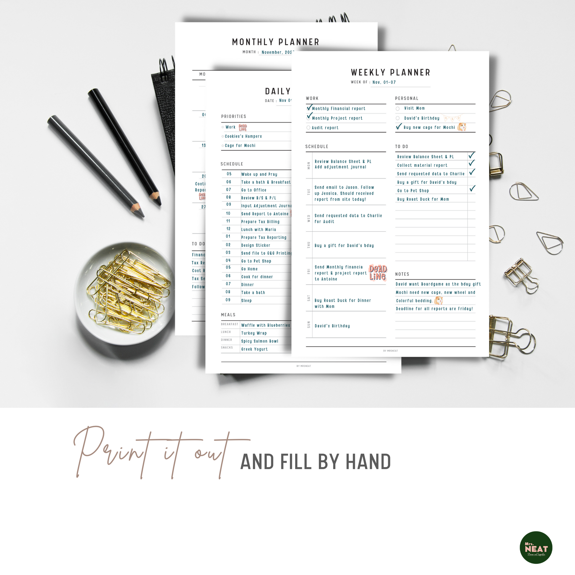 Daily, Weekly and Monthly Planner Printable printed out on the paper with stationery surround
